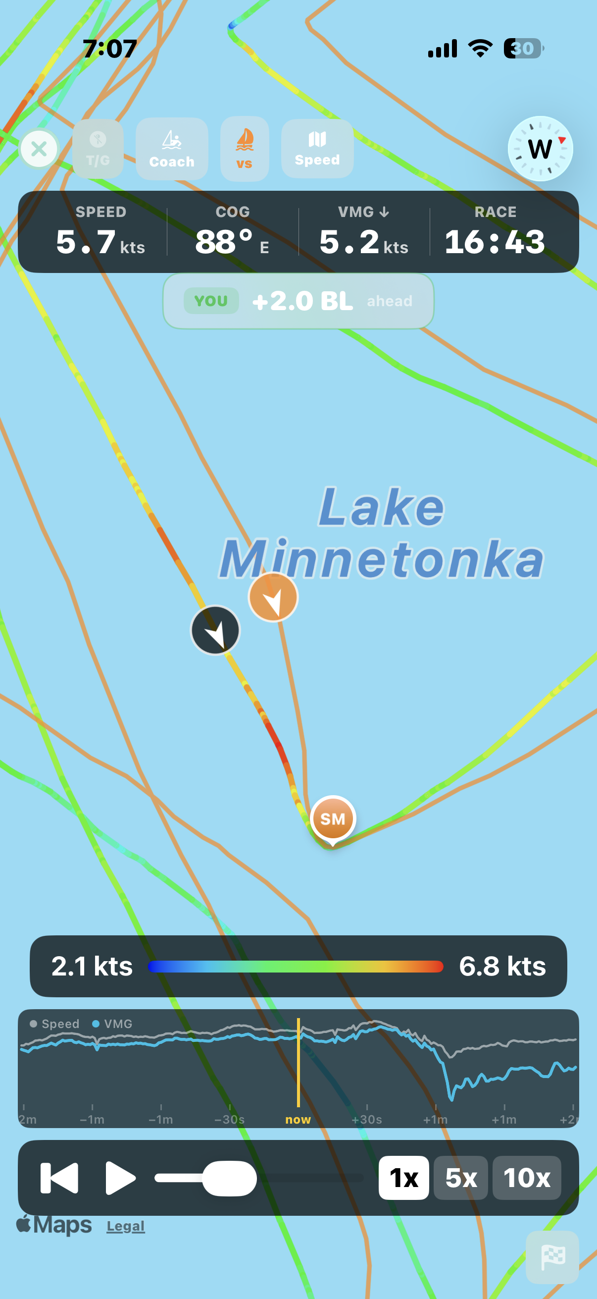 axiotrax Boat vs. Boat — two GPS tracks on the same map, playback timeline showing both boats racing